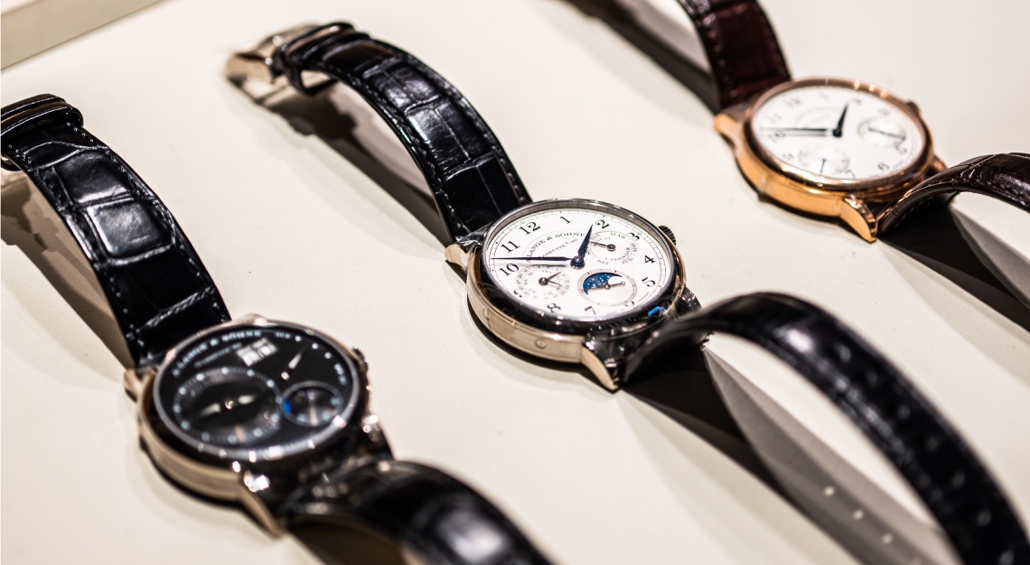 Three A. Lange & Söhne’s timepieces displayed on a counter