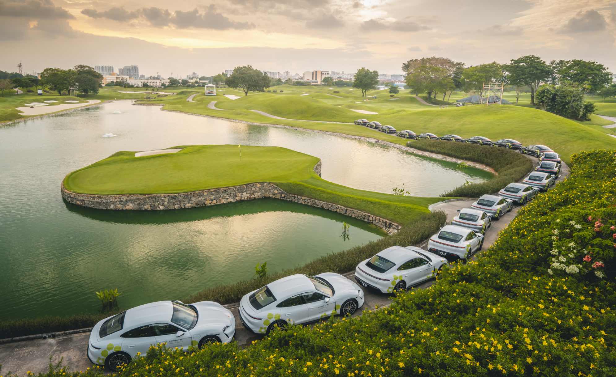 a line of Porsche Tacans lined at the Laguna National Goolf Resort Club for the Porsche Singapore Classic