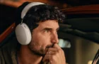 a man wearing the first pair of Sonos headphones