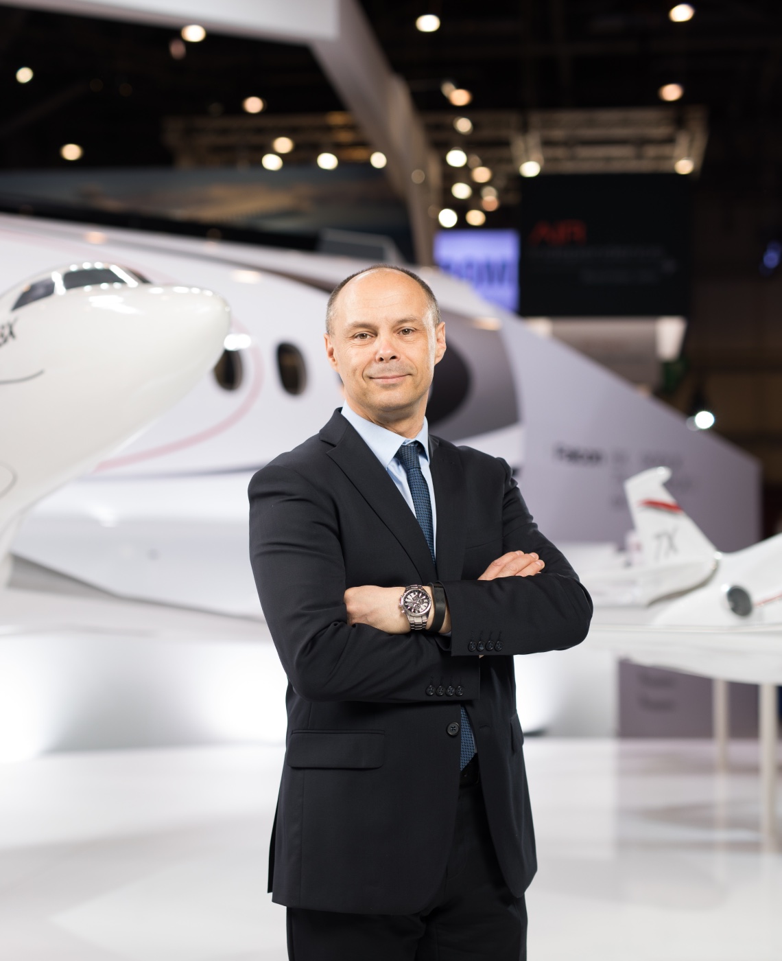 profile of Carlos brana in front of a Dassault Aviation aircraft