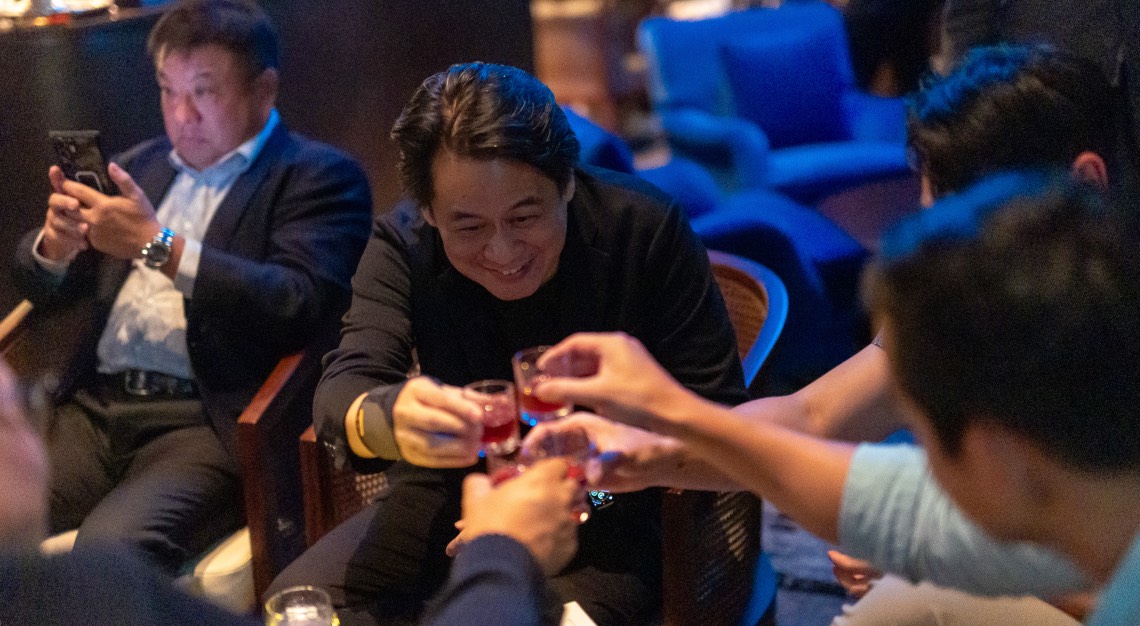 guests toasting at the Punch Room during the Macallan experience